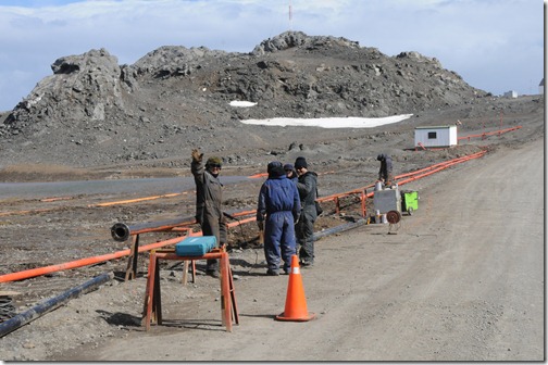 Workers putting in new infrastructure between the airport and the Russian and Chilean settlements on King George Island, Antarctica.
